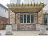 Custom Pergola with Stone Pillars