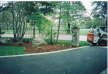 Front Corner of Driveway Full Landscape cedar mulch accent garden