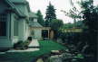 Right SIde Yard sod interlock walkway placement rocks plant materials